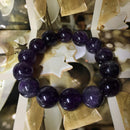 12mm natural amethyst beaded bracelet with polished purple gemstones on stretch cord, unisex healing crystal jewelry for stress relief and chakra balance